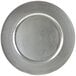 A close-up of a 10 Strawberry Street silver charger plate with a circular edge.