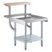 A Regency stainless steel equipment stand with a wooden top and undershelf.