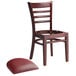 A Lancaster Table & Seating mahogany wood chair with a missing burgundy vinyl seat