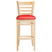 Lancaster Table & Seating Natural Ladder Back Bar Height Chair with 2 1/2" Red Padded Seat Main Thumbnail 5