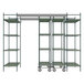 A grey metal Metro Top-Track shelving unit with shelves and wheels.