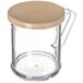 A clear Carlisle polycarbonate shaker with a beige lid.