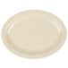 A tan oval platter with a white border.