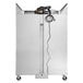 A large silver metal Continental Refrigerator reach-in freezer with black wires.