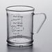 A clear polycarbonate measuring cup with a handle and numbers on it.