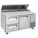 A Turbo Air stainless steel pizza prep table with 2 drawers.