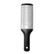 An OXO stainless steel grater with a black non-slip handle.