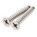 A close up of two stainless steel screws.