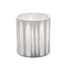 A white porcelain votive holder with a striped pattern.