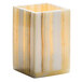 A white and yellow marble Luxor Alabaster tealight holder.