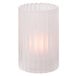 A clear glass Hollowick crystal cylinder candle holder with a light inside.