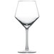 A clear Schott Zwiesel Pure Burgundy wine glass with a stem.