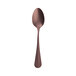A Sola Vintage Copper spoon with a silver bowl.