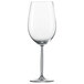 A close-up of a Schott Zwiesel clear wine glass with a long stem.