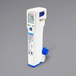 A close-up of a Comark FoodPro Plus digital thermometer with a blue and white design and a screen.