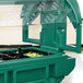 A green Cambro Versa Ultra food and salad bar container with lettuce inside.
