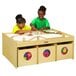 Two children playing with a Jonti-Craft activity table with bins.
