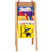 A Jonti-Craft wooden book rack with books on it.