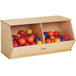 A Jonti-Craft wooden toy bin filled with colorful balls.