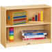 A Jonti-Craft wooden shelf with toys and books on it.