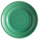A close-up of a Tuxton Concentrix Cilantro green plate with a spiral pattern.