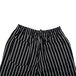 A pair of Chef Revival black and white pinstripe chef pants.
