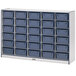 A white and navy Rainbow Accents storage unit with many bins, including a blue plastic bin with a black handle.