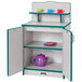 A Rainbow Accents teal kitchen cupboard with teacups and cups inside.
