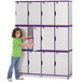 A young girl standing next to a purple Rainbow Accents locker.