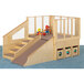A Jonti-Craft wooden play loft with stairs and a slide over carpet with see-n-wheel toy bins.
