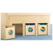 A Jonti-Craft wooden play loft with carpeted flooring and see-n-wheel bins underneath.
