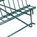 A green Metro wire tray drying rack mounted on a Metro SmartWall.