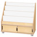 A wooden book rack with white shelves holding white paper.