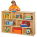 A girl playing with toys on a Young Time natural storage shelf.