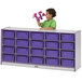 A little girl using a purple Rainbow Accents mobile storage cabinet with purple tubs.