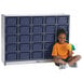 A young girl sitting next to a Rainbow Accents navy and gray storage cabinet.