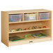 A Jonti-Craft wooden storage cabinet with toys and plastic bins on a wooden shelf.