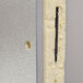 A close up of a Norlake Kold Locker metal door.