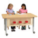 Two children working at a Jonti-Craft children's STEM table with whiteboard panels and drawers.