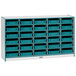 A white shelf with teal paper trays and blue bins.