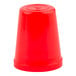 A red plastic cone tip cap on a white background.