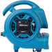 A blue XPOWER air blower with black outlets.