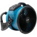 An XPOWER blue and black DC powered air circulator utility fan with a handle.
