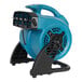 A blue and black XPOWER outdoor misting fan on a stand.