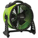 An XPOWER green and black portable utility fan.