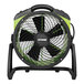 An XPOWER green and black portable air circulator fan on a stand.