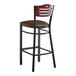A Lancaster Table & Seating black bistro bar stool with a dark brown cushioned seat.
