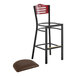 A Lancaster Table & Seating black bistro bar stool with a dark brown vinyl seat