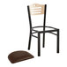 A Lancaster Table & Seating black bistro chair with a dark brown cushion on the seat.