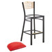 A Lancaster Table & Seating black bistro bar stool with a red vinyl seat.